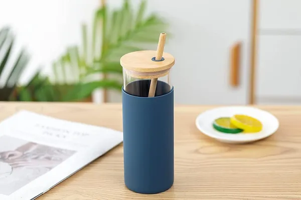 Glass_sipper_with_silicon_grip_and_bamboo_wooden_lid_with_bamboo_straw_pack_of_1