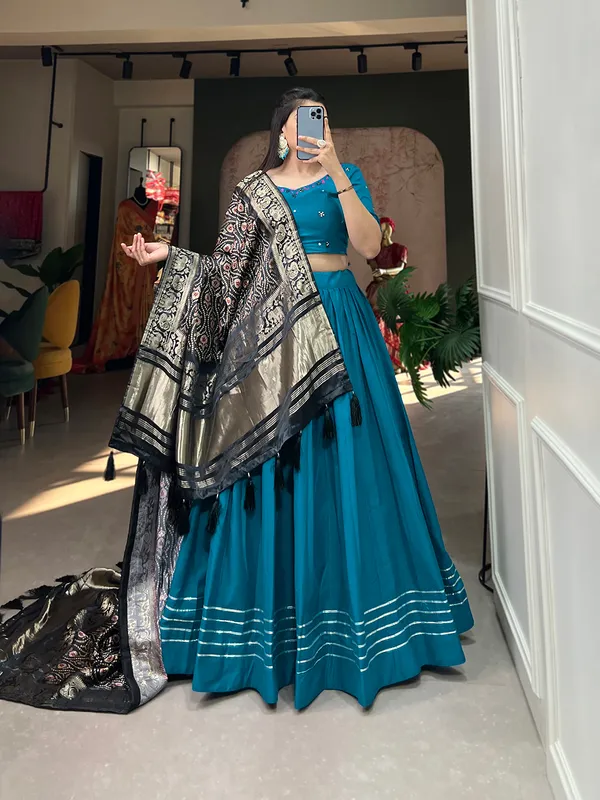 Step_into_a_world_of_elegance_and_grace_with_the_delicate_charm_of_pure_cotton_lehenga_and_the_lustrous_allure_of_gaji_silk_dupatta