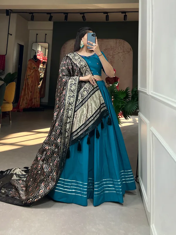 Step_into_a_world_of_elegance_and_grace_with_the_delicate_charm_of_pure_cotton_lehenga_and_the_lustrous_allure_of_gaji_silk_dupatta
