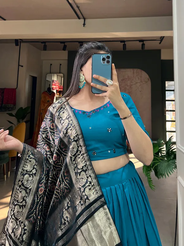 Step_into_a_world_of_elegance_and_grace_with_the_delicate_charm_of_pure_cotton_lehenga_and_the_lustrous_allure_of_gaji_silk_dupatta