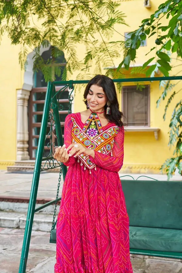 Celebrate_this_Navratri_in_full_color_and_culture_with_our_stunning_traditional_maxi_dresses._Featuring_bold_Bandhani_prints_and_handcrafted_mirror-work_yokes,_each_outfit_radiates_ethnic_charm._Choose_your_festive_hue_—_Sunshine_Yellow,_Royal_Purple,_Electric_Blue,_or_Fiery_Red_—_and_dance_through_the_nights_in_comfort_and_elegance.