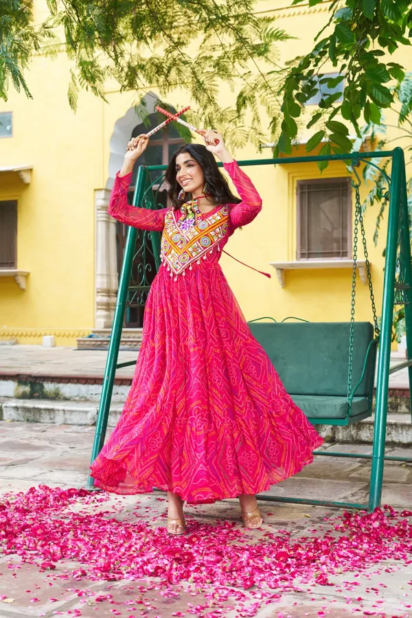 Celebrate_this_Navratri_in_full_color_and_culture_with_our_stunning_traditional_maxi_dresses._Featuring_bold_Bandhani_prints_and_handcrafted_mirror-work_yokes,_each_outfit_radiates_ethnic_charm._Choose_your_festive_hue_—_Sunshine_Yellow,_Royal_Purple,_Electric_Blue,_or_Fiery_Red_—_and_dance_through_the_nights_in_comfort_and_elegance.