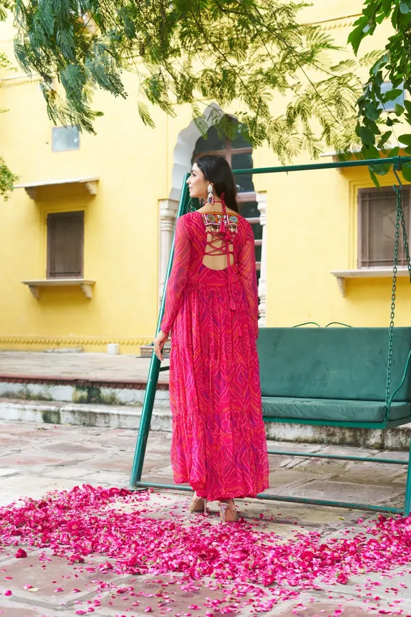 Celebrate_this_Navratri_in_full_color_and_culture_with_our_stunning_traditional_maxi_dresses._Featuring_bold_Bandhani_prints_and_handcrafted_mirror-work_yokes,_each_outfit_radiates_ethnic_charm._Choose_your_festive_hue_—_Sunshine_Yellow,_Royal_Purple,_Electric_Blue,_or_Fiery_Red_—_and_dance_through_the_nights_in_comfort_and_elegance.
