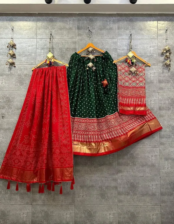 Dance_into_the_divine_spirit_of_Navratri_with_this_regal_black_and_maroon_lehenga,_adorned_in_traditional_prints_and_rich_Banarasi_borders.