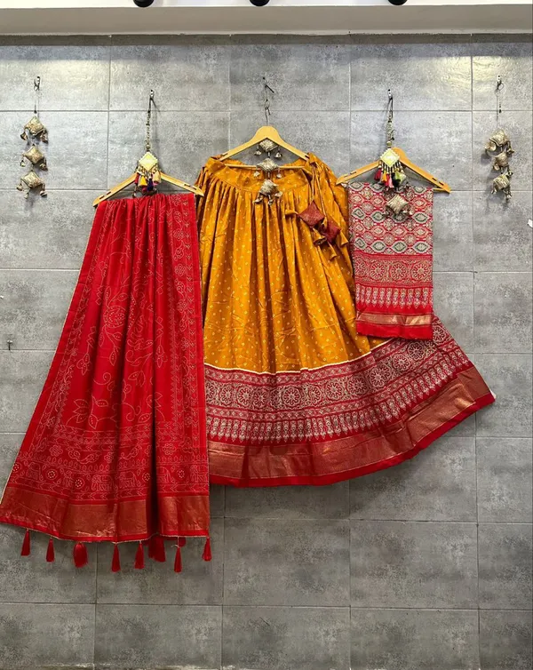 Dance_into_the_divine_spirit_of_Navratri_with_this_regal_black_and_maroon_lehenga,_adorned_in_traditional_prints_and_rich_Banarasi_borders.