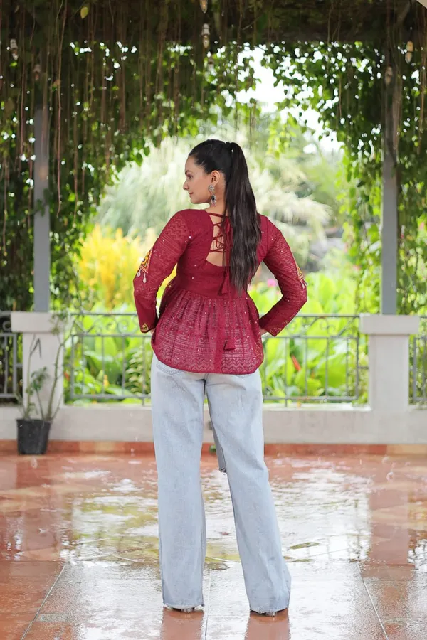 Featuring_mirror-work_embroidered_yokes,_tie-dye_Bandhani_patterns,_and_radiant_colors_like_emerald_green,_mustard_yellow,_and_fuchsia_pink_–_these_flowy_ensembles_are_a_celebration_in_themselves