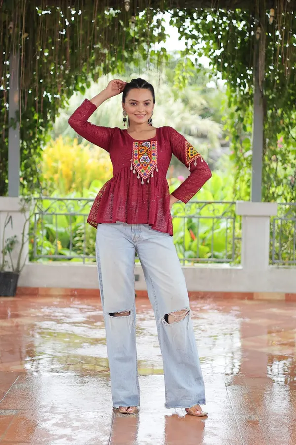 Featuring_mirror-work_embroidered_yokes,_tie-dye_Bandhani_patterns,_and_radiant_colors_like_emerald_green,_mustard_yellow,_and_fuchsia_pink_–_these_flowy_ensembles_are_a_celebration_in_themselves