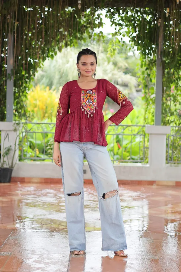Featuring_mirror-work_embroidered_yokes,_tie-dye_Bandhani_patterns,_and_radiant_colors_like_emerald_green,_mustard_yellow,_and_fuchsia_pink_–_these_flowy_ensembles_are_a_celebration_in_themselves