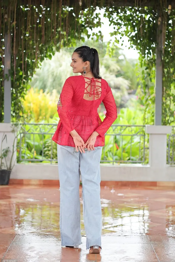 Featuring_mirror-work_embroidered_yokes,_tie-dye_Bandhani_patterns,_and_radiant_colors_like_emerald_green,_mustard_yellow,_and_fuchsia_pink_–_these_flowy_ensembles_are_a_celebration_in_themselves