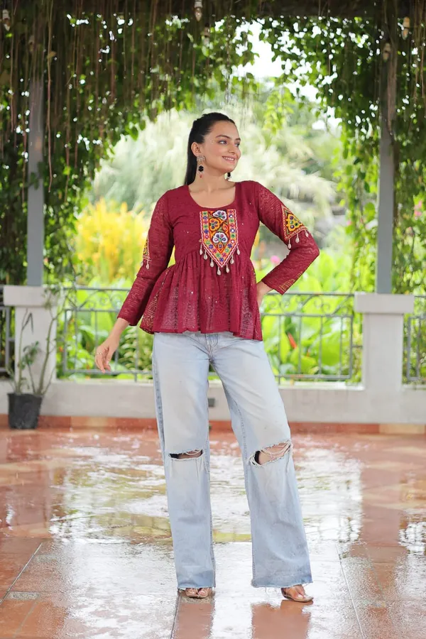 Featuring_mirror-work_embroidered_yokes,_tie-dye_Bandhani_patterns,_and_radiant_colors_like_emerald_green,_mustard_yellow,_and_fuchsia_pink_–_these_flowy_ensembles_are_a_celebration_in_themselves