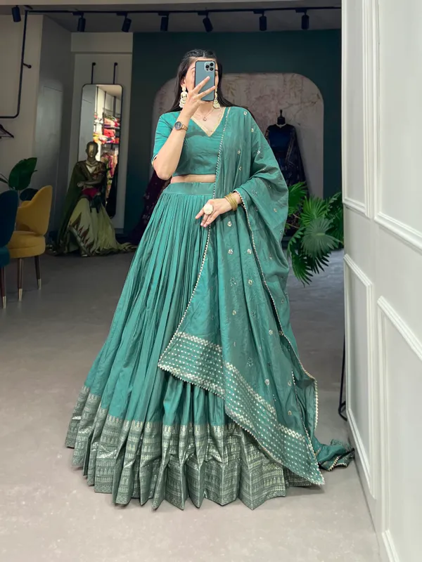Crafted_for_Grace_and_Beauty:_Pure_Chanderi_Plain_Lehenga_with_Intricate_Zari_Work_Border,_Accompanied_by_Sequin_Embellished_Dupatta_??