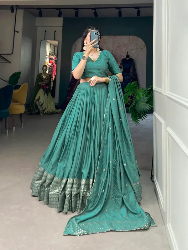 Crafted_for_Grace_and_Beauty:_Pure_Chanderi_Plain_Lehenga_with_Intricate_Zari_Work_Border,_Accompanied_by_Sequin_Embellished_Dupatta_??