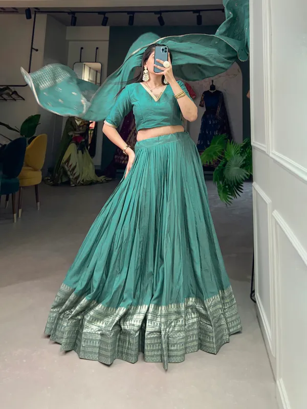 Crafted_for_Grace_and_Beauty:_Pure_Chanderi_Plain_Lehenga_with_Intricate_Zari_Work_Border,_Accompanied_by_Sequin_Embellished_Dupatta_??