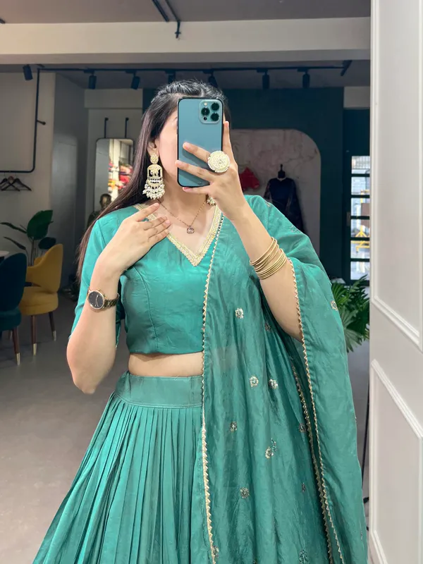 Crafted_for_Grace_and_Beauty:_Pure_Chanderi_Plain_Lehenga_with_Intricate_Zari_Work_Border,_Accompanied_by_Sequin_Embellished_Dupatta_??