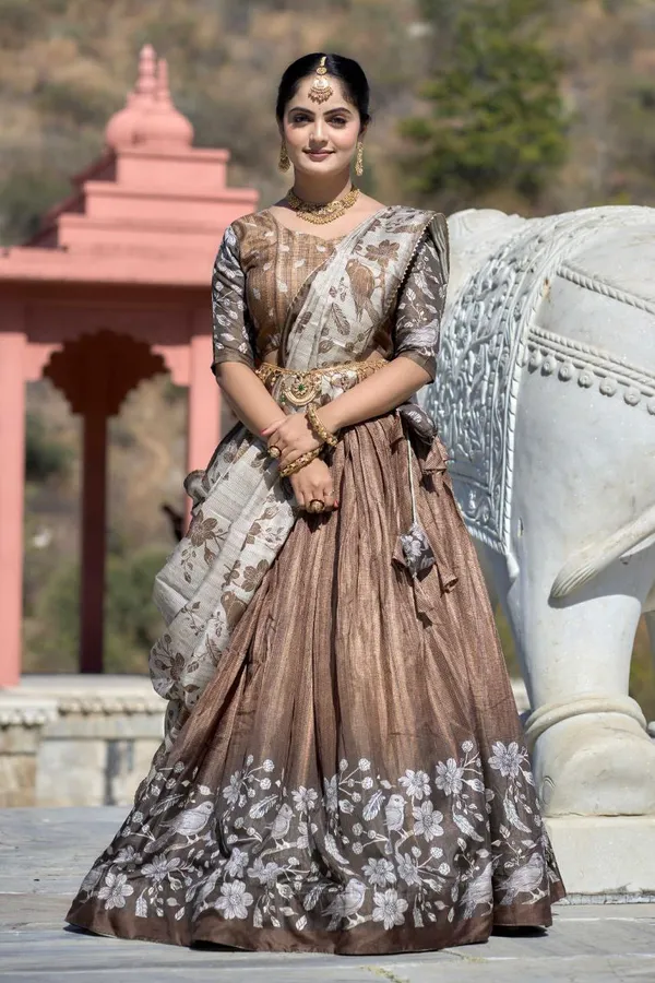 Light_as_air,_bold_as_love__let_this_pastel_beauty_be_your_statement_of_effortless_charm.Pure_Dolla_silk_chaniya_choli_with_viving_mill_foil