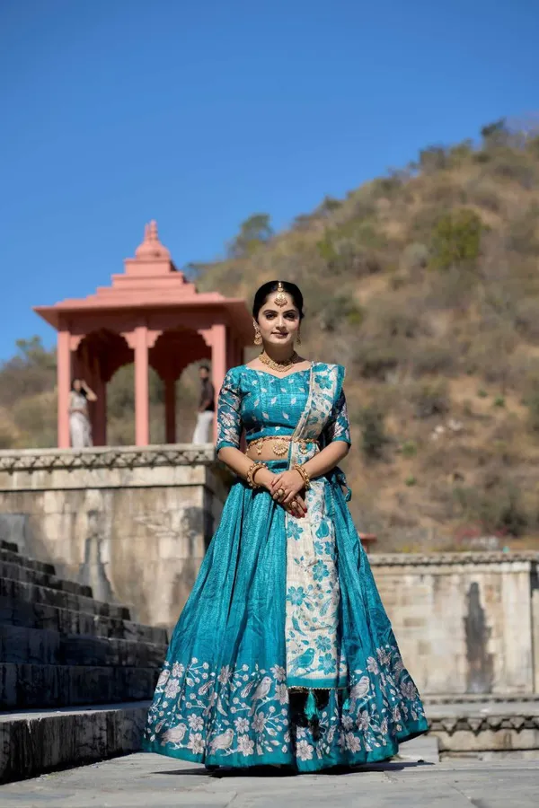 Light_as_air,_bold_as_love__let_this_pastel_beauty_be_your_statement_of_effortless_charm.Pure_Dolla_silk_chaniya_choli_with_viving_mill_foil