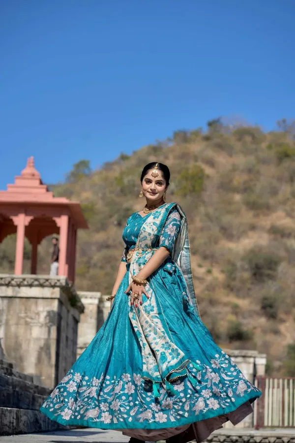 Light_as_air,_bold_as_love__let_this_pastel_beauty_be_your_statement_of_effortless_charm.Pure_Dolla_silk_chaniya_choli_with_viving_mill_foil