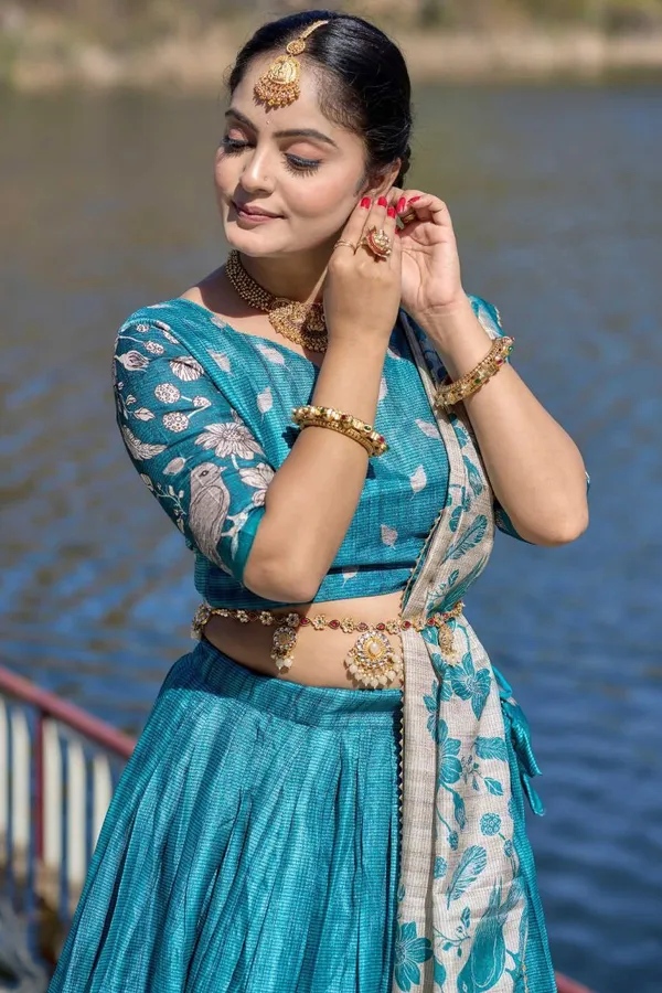 Light_as_air,_bold_as_love__let_this_pastel_beauty_be_your_statement_of_effortless_charm.Pure_Dolla_silk_chaniya_choli_with_viving_mill_foil