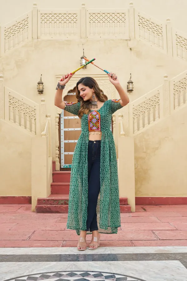 Perfect_for_Garba_nights_and_Dandiya_Raas,_each_outfit_is_paired_with_classic_oxidized_jewelry_and_colorful_dandiyas_to_complete_your_traditional_diva_look.