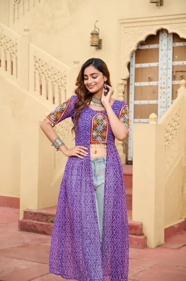 Perfect_for_Garba_nights_and_Dandiya_Raas,_each_outfit_is_paired_with_classic_oxidized_jewelry_and_colorful_dandiyas_to_complete_your_traditional_diva_look.