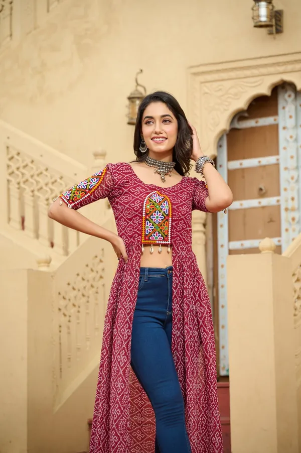 Perfect_for_Garba_nights_and_Dandiya_Raas,_each_outfit_is_paired_with_classic_oxidized_jewelry_and_colorful_dandiyas_to_complete_your_traditional_diva_look.