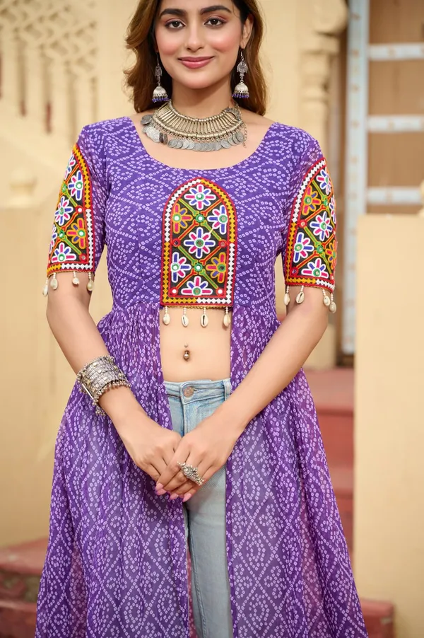 Perfect_for_Garba_nights_and_Dandiya_Raas,_each_outfit_is_paired_with_classic_oxidized_jewelry_and_colorful_dandiyas_to_complete_your_traditional_diva_look.