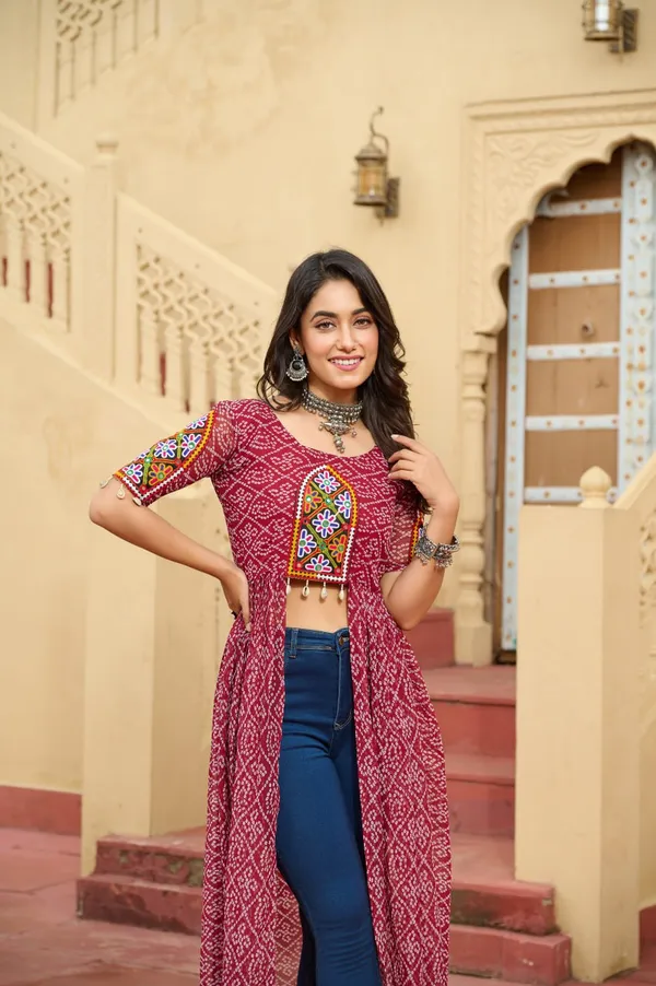 Perfect_for_Garba_nights_and_Dandiya_Raas,_each_outfit_is_paired_with_classic_oxidized_jewelry_and_colorful_dandiyas_to_complete_your_traditional_diva_look.
