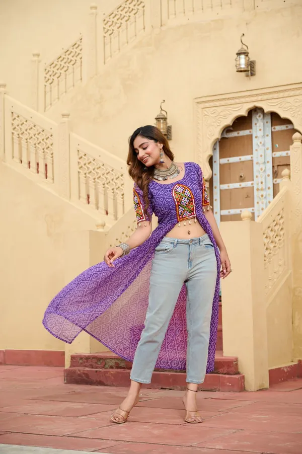 Perfect_for_Garba_nights_and_Dandiya_Raas,_each_outfit_is_paired_with_classic_oxidized_jewelry_and_colorful_dandiyas_to_complete_your_traditional_diva_look.