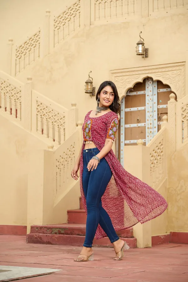 Perfect_for_Garba_nights_and_Dandiya_Raas,_each_outfit_is_paired_with_classic_oxidized_jewelry_and_colorful_dandiyas_to_complete_your_traditional_diva_look.