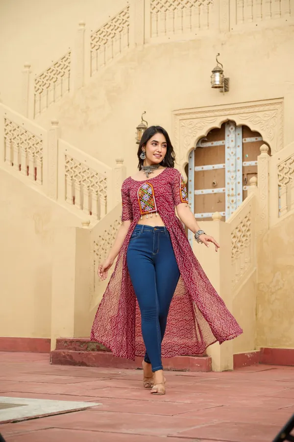 Perfect_for_Garba_nights_and_Dandiya_Raas,_each_outfit_is_paired_with_classic_oxidized_jewelry_and_colorful_dandiyas_to_complete_your_traditional_diva_look.