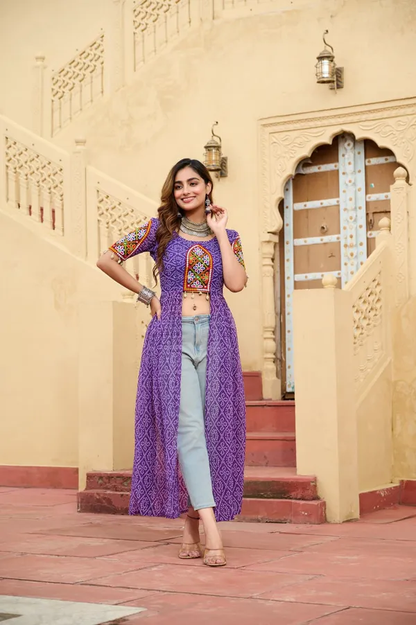 Perfect_for_Garba_nights_and_Dandiya_Raas,_each_outfit_is_paired_with_classic_oxidized_jewelry_and_colorful_dandiyas_to_complete_your_traditional_diva_look.