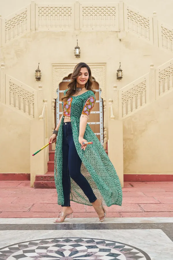 Perfect_for_Garba_nights_and_Dandiya_Raas,_each_outfit_is_paired_with_classic_oxidized_jewelry_and_colorful_dandiyas_to_complete_your_traditional_diva_look.