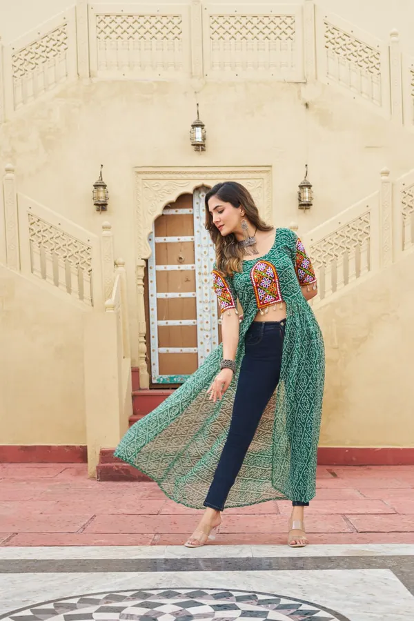 Perfect_for_Garba_nights_and_Dandiya_Raas,_each_outfit_is_paired_with_classic_oxidized_jewelry_and_colorful_dandiyas_to_complete_your_traditional_diva_look.