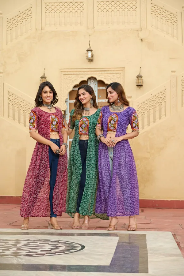Perfect_for_Garba_nights_and_Dandiya_Raas,_each_outfit_is_paired_with_classic_oxidized_jewelry_and_colorful_dandiyas_to_complete_your_traditional_diva_look.