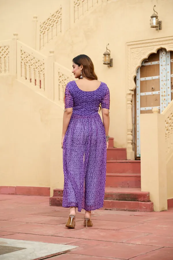Perfect_for_Garba_nights_and_Dandiya_Raas,_each_outfit_is_paired_with_classic_oxidized_jewelry_and_colorful_dandiyas_to_complete_your_traditional_diva_look.