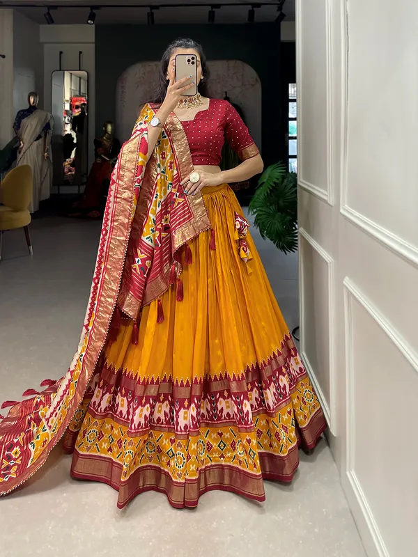 Splashing_elegance_with_every_hue__this_lehenga_is_a_canvas_of_festive_delight.Pure_Dolla_silk_chaniya_choli_with_viving_mill_foil