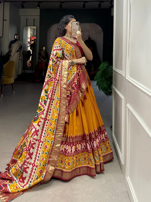 Splashing_elegance_with_every_hue__this_lehenga_is_a_canvas_of_festive_delight.Pure_Dolla_silk_chaniya_choli_with_viving_mill_foil