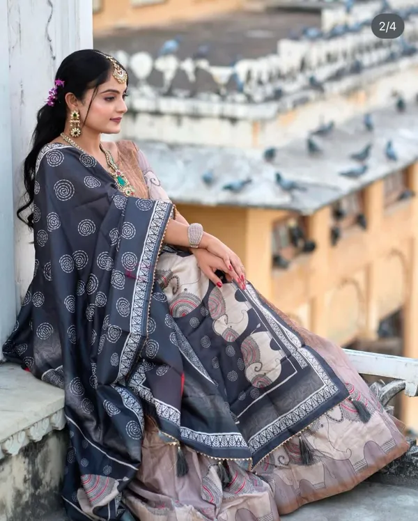 Structured_yet_soft,_the_floral_blouse_with_statement_sleeves_makes_this_lehenga_unforgettable.Pure_Dolla_silk_chaniya_choli_with_viving_mill_foil