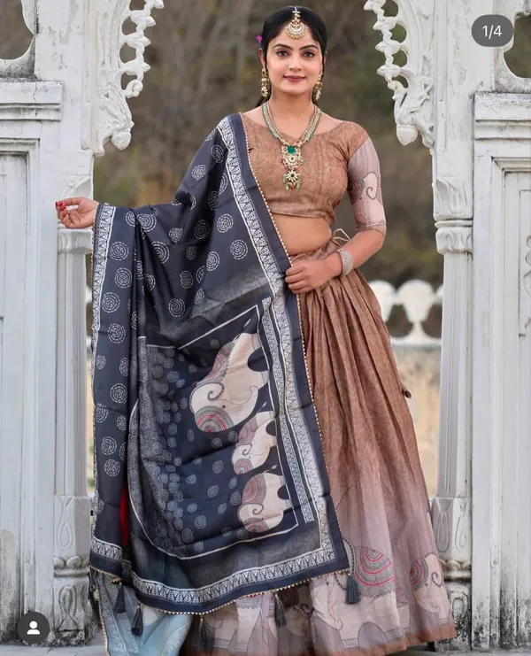 Structured_yet_soft,_the_floral_blouse_with_statement_sleeves_makes_this_lehenga_unforgettable.Pure_Dolla_silk_chaniya_choli_with_viving_mill_foil
