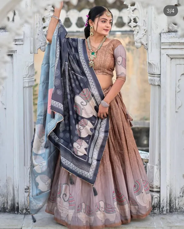 Structured_yet_soft,_the_floral_blouse_with_statement_sleeves_makes_this_lehenga_unforgettable.Pure_Dolla_silk_chaniya_choli_with_viving_mill_foil
