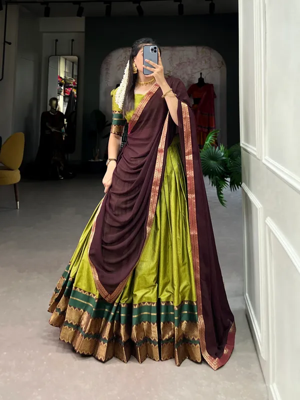 Immerse_Yourself_in_Tradition_with_Our_South_Style_Poly_Cotton_Half_Saree,_Paired_with_an_Elegant_Georgette_Dupatta??