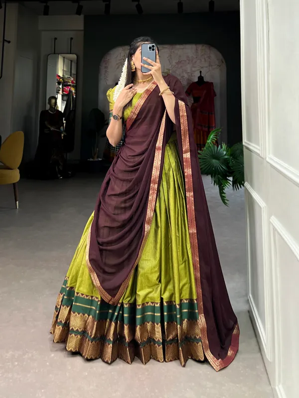 Immerse_Yourself_in_Tradition_with_Our_South_Style_Poly_Cotton_Half_Saree,_Paired_with_an_Elegant_Georgette_Dupatta??