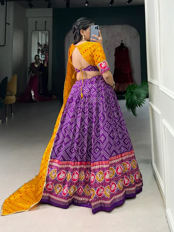 This_beautifully_printed_lehenga_design_going_from_a_royal_shade_ensemble_for_function