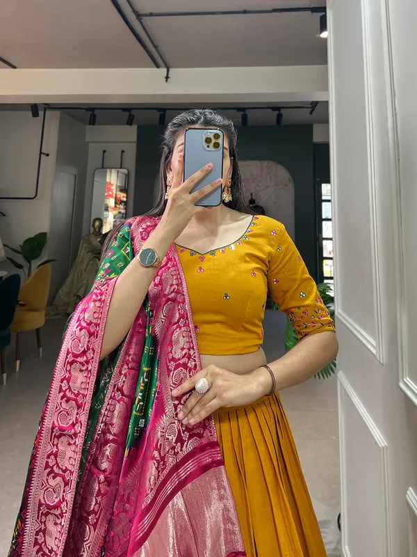 Step_into_a_world_of_elegance_and_grace_with_the_delicate_charm_of_pure_cotton_lehenga_and_the_lustrous_allure_of_gaji_silk_dupatta