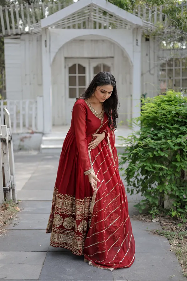 Maroon_Faux_Blooming_Gown_With_Dupatta_With_Attractive_Embroidered_Sequins_Work_With_Lace_Border_For_Women