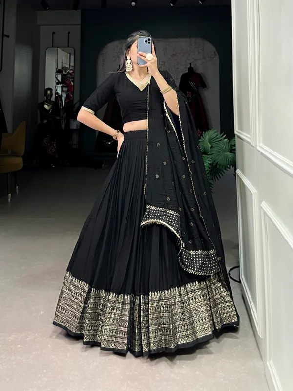 Crafted_for_Grace_and_Beauty:_Pure_Chanderi_Plain_Lehenga_with_Intricate_Zari_Work_Border,_Accompanied_by_Sequin_Embellished_Dupatta_??