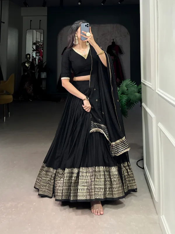 Crafted_for_Grace_and_Beauty:_Pure_Chanderi_Plain_Lehenga_with_Intricate_Zari_Work_Border,_Accompanied_by_Sequin_Embellished_Dupatta_??