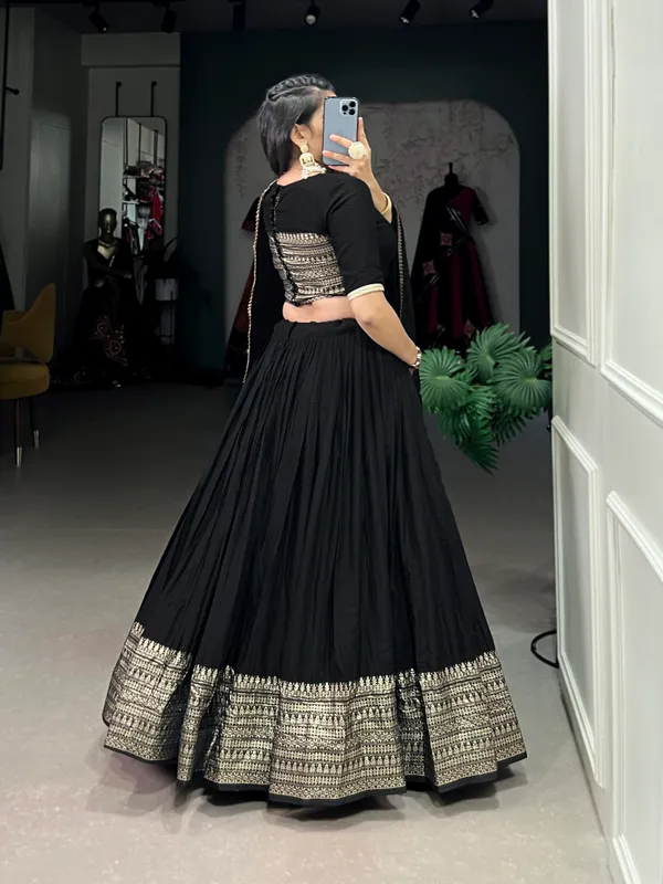 Crafted_for_Grace_and_Beauty:_Pure_Chanderi_Plain_Lehenga_with_Intricate_Zari_Work_Border,_Accompanied_by_Sequin_Embellished_Dupatta_??