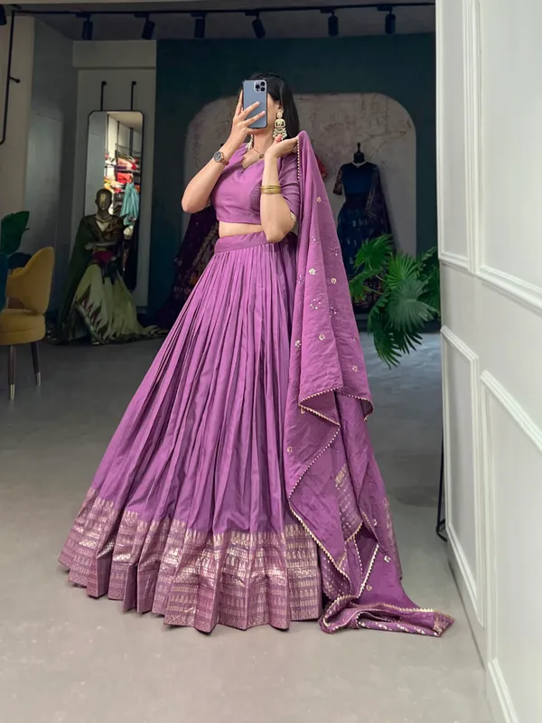 Crafted_for_Grace_and_Beauty:_Pure_Chanderi_Plain_Lehenga_with_Intricate_Zari_Work_Border,_Accompanied_by_Sequin_Embellished_Dupatta_??