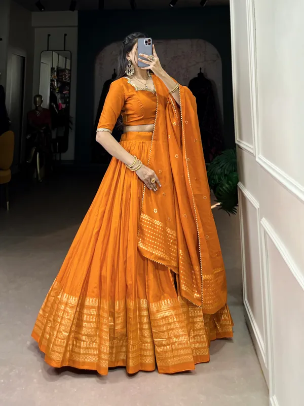 Crafted_for_Grace_and_Beauty:_Pure_Chanderi_Plain_Lehenga_with_Intricate_Zari_Work_Border,_Accompanied_by_Sequin_Embellished_Dupatta_??